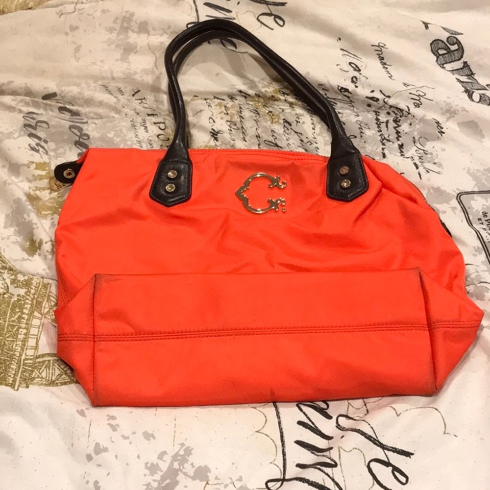 Wonder brand purse in brilliant peach